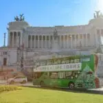Tour bus in front of historical building, Rome
