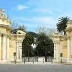 Entrance to Rome Zoo with decorative statues.